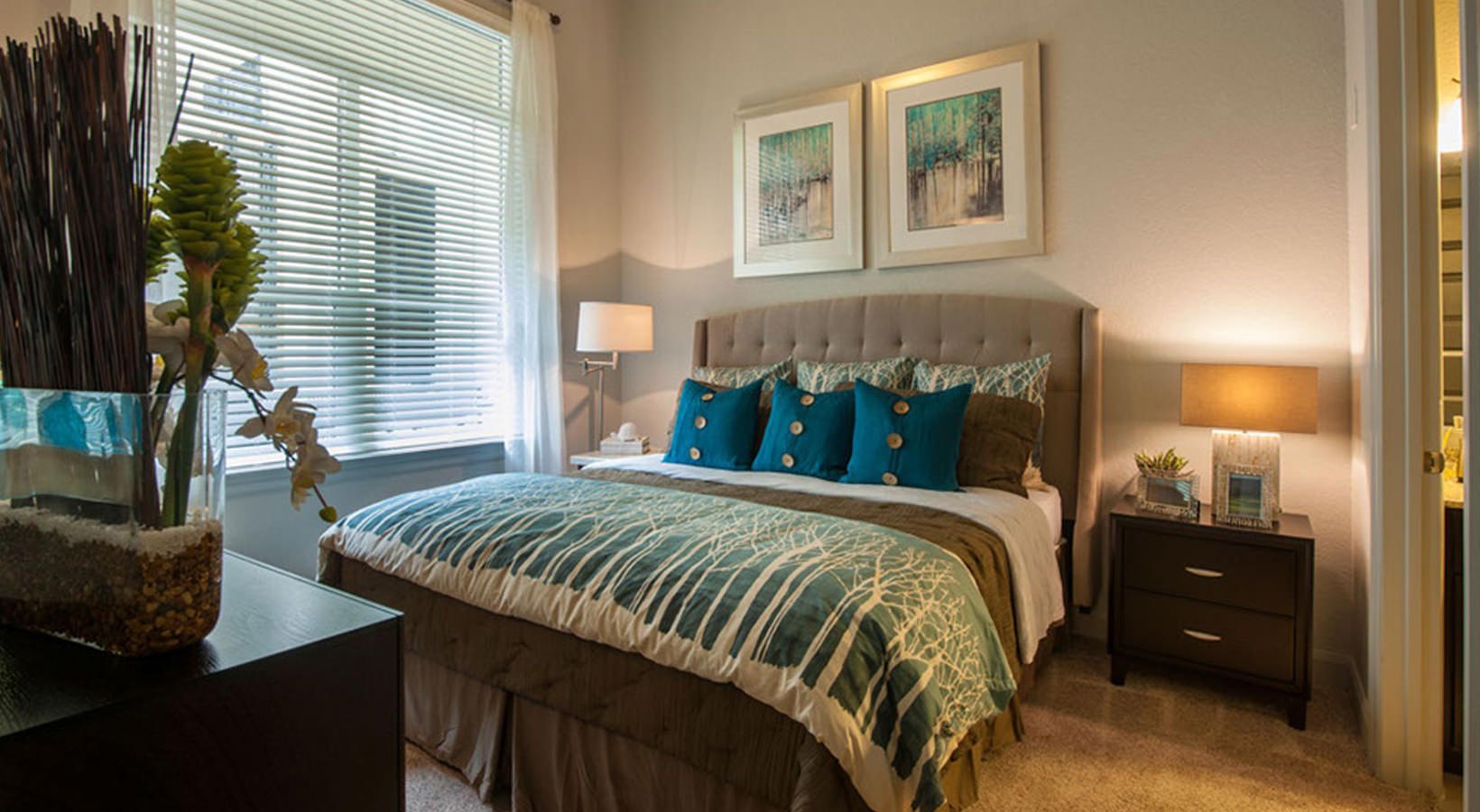 Bedroom  Spacious and well lit bedroom with plush carpet and large windows